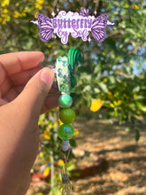 Load image into Gallery viewer, Disgust themed badge reel ( 360 swivel clip )