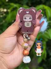 Load image into Gallery viewer, Nommi trinket badge reel